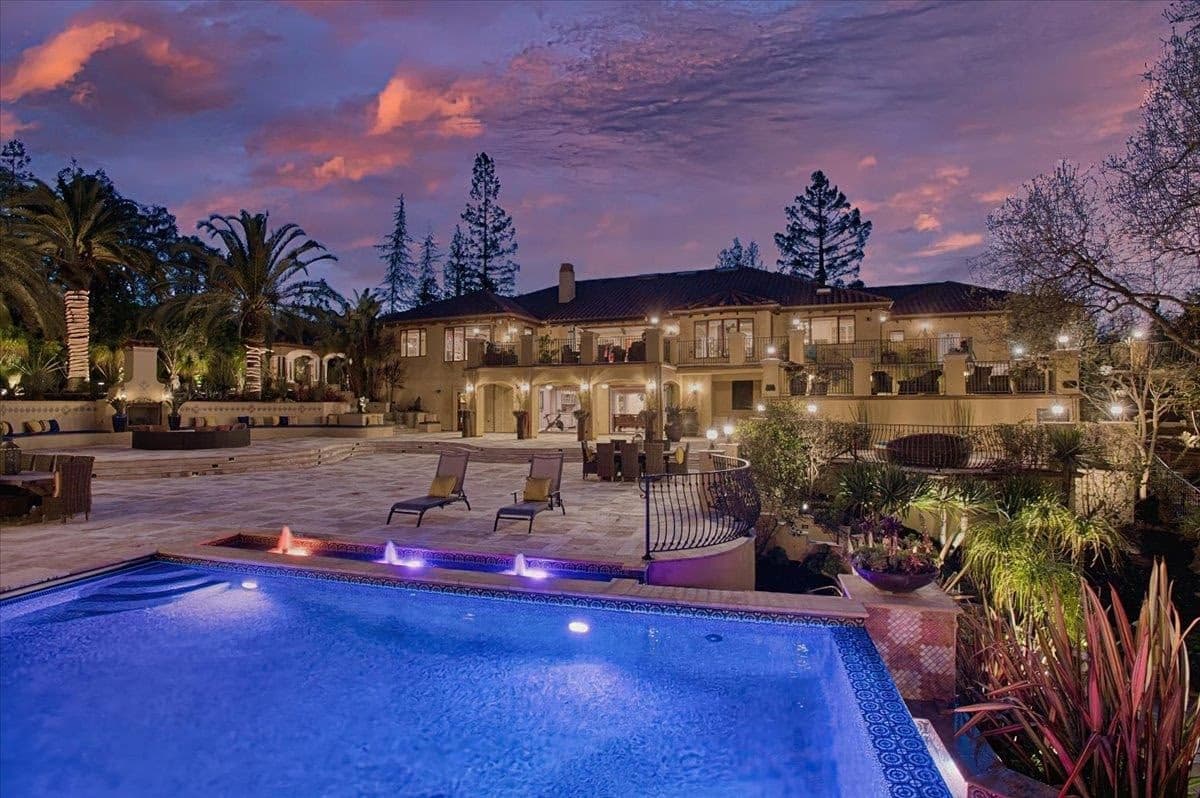 Traditional Indian wedding ceremony with participants in colorful attire performing sacred rituals